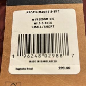 The North Face Women's Freedom Ski Bib. Size Small/Short. Color:Wild Ginger-plum